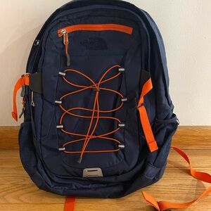 The North Face Dark Blue and Bright Orange Backpack